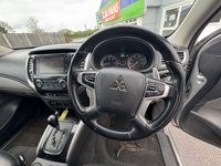 USED 2019 19 MITSUBISHI L200 2.4 DI-D DC Warrior Pickup Double Cab 4dr Diesel Auto 4WD Euro 6 (178 ps) With only one owner and exceptionally low mileage for its age, this 2019 Mitsubishi L200 2.4 DI-D DC Warrior Pickup Double Cab presents a superb opportunity. This Euro 6 compliant, four wheel drive diesel automatic boasts a powerful 2.4 litre engine and a substantial towing weight of 3100 kg, making it a capable workhorse. Its clear vehicle history check provides peace of mind, while notable features include Bi-Xenon HID headlamps, front seat heaters, a rear view camera, automatic light sensors.