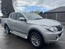 USED 2019 19 MITSUBISHI L200 2.4 DI-D DC Warrior Pickup Double Cab 4dr Diesel Auto 4WD Euro 6 (178 ps) With only one owner and exceptionally low mileage for its age, this 2019 Mitsubishi L200 2.4 DI-D DC Warrior Pickup Double Cab presents a superb opportunity. This Euro 6 compliant, four wheel drive diesel automatic boasts a powerful 2.4 litre engine and a substantial towing weight of 3100 kg, making it a capable workhorse. Its clear vehicle history check provides peace of mind, while notable features include Bi-Xenon HID headlamps, front seat heaters, a rear view camera, automatic light sensors.