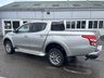 USED 2019 19 MITSUBISHI L200 2.4 DI-D DC Warrior Pickup Double Cab 4dr Diesel Auto 4WD Euro 6 (178 ps) With only one owner and exceptionally low mileage for its age, this 2019 Mitsubishi L200 2.4 DI-D DC Warrior Pickup Double Cab presents a superb opportunity. This Euro 6 compliant, four wheel drive diesel automatic boasts a powerful 2.4 litre engine and a substantial towing weight of 3100 kg, making it a capable workhorse. Its clear vehicle history check provides peace of mind, while notable features include Bi-Xenon HID headlamps, front seat heaters, a rear view camera, automatic light sensors.