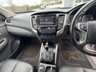 USED 2019 19 MITSUBISHI L200 2.4 DI-D DC Warrior Pickup Double Cab 4dr Diesel Auto 4WD Euro 6 (178 ps) With only one owner and exceptionally low mileage for its age, this 2019 Mitsubishi L200 2.4 DI-D DC Warrior Pickup Double Cab presents a superb opportunity. This Euro 6 compliant, four wheel drive diesel automatic boasts a powerful 2.4 litre engine and a substantial towing weight of 3100 kg, making it a capable workhorse. Its clear vehicle history check provides peace of mind, while notable features include Bi-Xenon HID headlamps, front seat heaters, a rear view camera, automatic light sensors.