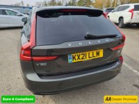 USED 2021 21 VOLVO V90 Grey 2.0 B4 MHEV R-Design, 80,900 miles, ULEZ compliant, Automatic, Sat Nav, Leather, Rear camera, CarPlay/Android Auto, Full Volvo Service history This 2021 Volvo V90 B4 R Design offers a compelling blend of style and efficiency, boasting a 2.0 litre petrol hybrid engine and meeting Euro 6 emission standards.  With a 3 month warranty for your peace of mind, this R Design trim level comes equipped with a Climate Pack featuring heated seats and a heated steering wheel, perfect for those colder days.  Enjoy seamless connectivity with smartphone integration, including Apple CarPlay and Android Auto, and the convenience of Keyless Drive with ke