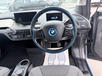 USED 2020 70 BMW I3 White 42.2kWh electric hatchback, 25,450 miles, Automatic, 19in alloys, CarPlay/Android Auto, Sat nav, Rear camera, Heated seats, DAB, A/C. This 2020 BMW i3 presents an exceptional ownership proposition, having been meticulously maintained by a single owner and boasting remarkably low mileage for its age at just 25,450 miles. As a fully electric vehicle, it offers an impressive battery total capacity of 42 kWh, providing a maximum range of 190 miles when new. Charging is convenient, with a full charge at home using a 7kW charger taking approximately 5 hours and 15 minutes, while rapid public charging can replenish the battery from e