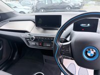 USED 2020 70 BMW I3 White 42.2kWh electric hatchback, 25,450 miles, Automatic, 19in alloys, CarPlay/Android Auto, Sat nav, Rear camera, Heated seats, DAB, A/C. This 2020 BMW i3 presents an exceptional ownership proposition, having been meticulously maintained by a single owner and boasting remarkably low mileage for its age at just 25,450 miles. As a fully electric vehicle, it offers an impressive battery total capacity of 42 kWh, providing a maximum range of 190 miles when new. Charging is convenient, with a full charge at home using a 7kW charger taking approximately 5 hours and 15 minutes, while rapid public charging can replenish the battery from e