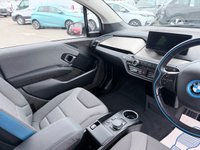 USED 2020 70 BMW I3 White 42.2kWh electric hatchback, 25,450 miles, Automatic, 19in alloys, CarPlay/Android Auto, Sat nav, Rear camera, Heated seats, DAB, A/C. This 2020 BMW i3 presents an exceptional ownership proposition, having been meticulously maintained by a single owner and boasting remarkably low mileage for its age at just 25,450 miles. As a fully electric vehicle, it offers an impressive battery total capacity of 42 kWh, providing a maximum range of 190 miles when new. Charging is convenient, with a full charge at home using a 7kW charger taking approximately 5 hours and 15 minutes, while rapid public charging can replenish the battery from e