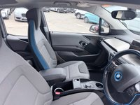 USED 2020 70 BMW I3 White 42.2kWh electric hatchback, 25,450 miles, Automatic, 19in alloys, CarPlay/Android Auto, Sat nav, Rear camera, Heated seats, DAB, A/C. This 2020 BMW i3 presents an exceptional ownership proposition, having been meticulously maintained by a single owner and boasting remarkably low mileage for its age at just 25,450 miles. As a fully electric vehicle, it offers an impressive battery total capacity of 42 kWh, providing a maximum range of 190 miles when new. Charging is convenient, with a full charge at home using a 7kW charger taking approximately 5 hours and 15 minutes, while rapid public charging can replenish the battery from e