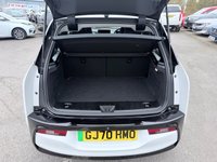 USED 2020 70 BMW I3 White 42.2kWh electric hatchback, 25,450 miles, Automatic, 19in alloys, CarPlay/Android Auto, Sat nav, Rear camera, Heated seats, DAB, A/C. This 2020 BMW i3 presents an exceptional ownership proposition, having been meticulously maintained by a single owner and boasting remarkably low mileage for its age at just 25,450 miles. As a fully electric vehicle, it offers an impressive battery total capacity of 42 kWh, providing a maximum range of 190 miles when new. Charging is convenient, with a full charge at home using a 7kW charger taking approximately 5 hours and 15 minutes, while rapid public charging can replenish the battery from e