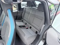 USED 2020 70 BMW I3 White 42.2kWh electric hatchback, 25,450 miles, Automatic, 19in alloys, CarPlay/Android Auto, Sat nav, Rear camera, Heated seats, DAB, A/C. This 2020 BMW i3 presents an exceptional ownership proposition, having been meticulously maintained by a single owner and boasting remarkably low mileage for its age at just 25,450 miles. As a fully electric vehicle, it offers an impressive battery total capacity of 42 kWh, providing a maximum range of 190 miles when new. Charging is convenient, with a full charge at home using a 7kW charger taking approximately 5 hours and 15 minutes, while rapid public charging can replenish the battery from e