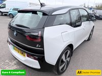 USED 2020 70 BMW I3 White 42.2kWh electric hatchback, 25,450 miles, Automatic, 19in alloys, CarPlay/Android Auto, Sat nav, Rear camera, Heated seats, DAB, A/C. This 2020 BMW i3 presents an exceptional ownership proposition, having been meticulously maintained by a single owner and boasting remarkably low mileage for its age at just 25,450 miles. As a fully electric vehicle, it offers an impressive battery total capacity of 42 kWh, providing a maximum range of 190 miles when new. Charging is convenient, with a full charge at home using a 7kW charger taking approximately 5 hours and 15 minutes, while rapid public charging can replenish the battery from e
