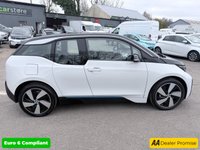 USED 2020 70 BMW I3 White 42.2kWh electric hatchback, 25,450 miles, Automatic, 19in alloys, CarPlay/Android Auto, Sat nav, Rear camera, Heated seats, DAB, A/C. This 2020 BMW i3 presents an exceptional ownership proposition, having been meticulously maintained by a single owner and boasting remarkably low mileage for its age at just 25,450 miles. As a fully electric vehicle, it offers an impressive battery total capacity of 42 kWh, providing a maximum range of 190 miles when new. Charging is convenient, with a full charge at home using a 7kW charger taking approximately 5 hours and 15 minutes, while rapid public charging can replenish the battery from e