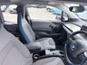 USED 2020 70 BMW I3 White 42.2kWh electric hatchback, 25,450 miles, Automatic, 19in alloys, CarPlay/Android Auto, Sat nav, Rear camera, Heated seats, DAB, A/C. This 2020 BMW i3 presents an exceptional ownership proposition, having been meticulously maintained by a single owner and boasting remarkably low mileage for its age at just 25,450 miles. As a fully electric vehicle, it offers an impressive battery total capacity of 42 kWh, providing a maximum range of 190 miles when new. Charging is convenient, with a full charge at home using a 7kW charger taking approximately 5 hours and 15 minutes, while rapid public charging can replenish the battery from e