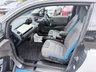 USED 2020 70 BMW I3 White 42.2kWh electric hatchback, 25,450 miles, Automatic, 19in alloys, CarPlay/Android Auto, Sat nav, Rear camera, Heated seats, DAB, A/C. This 2020 BMW i3 presents an exceptional ownership proposition, having been meticulously maintained by a single owner and boasting remarkably low mileage for its age at just 25,450 miles. As a fully electric vehicle, it offers an impressive battery total capacity of 42 kWh, providing a maximum range of 190 miles when new. Charging is convenient, with a full charge at home using a 7kW charger taking approximately 5 hours and 15 minutes, while rapid public charging can replenish the battery from e