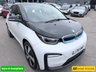 USED 2020 70 BMW I3 White 42.2kWh electric hatchback, 25,450 miles, Automatic, 19in alloys, CarPlay/Android Auto, Sat nav, Rear camera, Heated seats, DAB, A/C. This 2020 BMW i3 presents an exceptional ownership proposition, having been meticulously maintained by a single owner and boasting remarkably low mileage for its age at just 25,450 miles. As a fully electric vehicle, it offers an impressive battery total capacity of 42 kWh, providing a maximum range of 190 miles when new. Charging is convenient, with a full charge at home using a 7kW charger taking approximately 5 hours and 15 minutes, while rapid public charging can replenish the battery from e