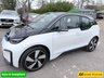 USED 2020 70 BMW I3 White 42.2kWh electric hatchback, 25,450 miles, Automatic, 19in alloys, CarPlay/Android Auto, Sat nav, Rear camera, Heated seats, DAB, A/C. This 2020 BMW i3 presents an exceptional ownership proposition, having been meticulously maintained by a single owner and boasting remarkably low mileage for its age at just 25,450 miles. As a fully electric vehicle, it offers an impressive battery total capacity of 42 kWh, providing a maximum range of 190 miles when new. Charging is convenient, with a full charge at home using a 7kW charger taking approximately 5 hours and 15 minutes, while rapid public charging can replenish the battery from e