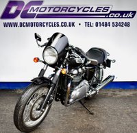 USED 2009 TRIUMPH Thruxton 900 865 Roadster/Retro (69 ps) A cool, low mileage collectable Caf&eacute; Racer here, a great colour scheme on what are becoming a rare sight these days.