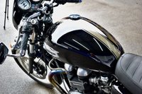 USED 2009 TRIUMPH Thruxton 900 865 Roadster/Retro (69 ps) A cool, low mileage collectable Caf&eacute; Racer here, a great colour scheme on what are becoming a rare sight these days.