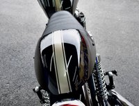 USED 2009 TRIUMPH Thruxton 900 865 Roadster/Retro (69 ps) A cool, low mileage collectable Caf&eacute; Racer here, a great colour scheme on what are becoming a rare sight these days.