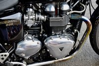 USED 2009 TRIUMPH Thruxton 900 865 Roadster/Retro (69 ps) A cool, low mileage collectable Caf&eacute; Racer here, a great colour scheme on what are becoming a rare sight these days.