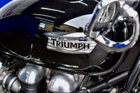 USED 2009 TRIUMPH Thruxton 900 865 Roadster/Retro (69 ps) A cool, low mileage collectable Caf&eacute; Racer here, a great colour scheme on what are becoming a rare sight these days.