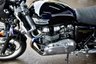 USED 2009 TRIUMPH Thruxton 900 865 Roadster/Retro (69 ps) A cool, low mileage collectable Caf&eacute; Racer here, a great colour scheme on what are becoming a rare sight these days.