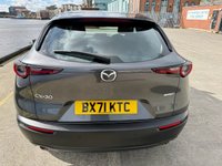 USED 2021 71 MAZDA CX-30 2.0 e-SKYACTIV X MHEV SE-L Lux SUV 5dr Petrol Manual Euro 6 (s/s) (186 ps) Huge value for this 71 reg fabulous example in dark steel grey metallic with Sat Nav , Reversing Camera , 6 Speed, Air Conditioning, Auto Climate Control, Automatic Lights, Cruise Control, Dual Zone Climate, Heated Seats ,alloys wheels -1 previous owner in immac condition -stylish looks and so good to drive with the backing of Mazda legendary quality and reliability -great buy -comes with MBI/ Warranty which can be extended and upgraded to 24 months , Feb 2027  MOT , Oil and Filter /PDI Service