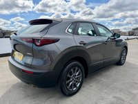 USED 2021 71 MAZDA CX-30 2.0 e-SKYACTIV X MHEV SE-L Lux SUV 5dr Petrol Manual Euro 6 (s/s) (186 ps) Huge value for this 71 reg fabulous example in dark steel grey metallic with Sat Nav , Reversing Camera , 6 Speed, Air Conditioning, Auto Climate Control, Automatic Lights, Cruise Control, Dual Zone Climate, Heated Seats ,alloys wheels -1 previous owner in immac condition -stylish looks and so good to drive with the backing of Mazda legendary quality and reliability -great buy -comes with MBI/ Warranty which can be extended and upgraded to 24 months , Feb 2027  MOT , Oil and Filter /PDI Service