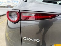 USED 2021 71 MAZDA CX-30 2.0 e-SKYACTIV X MHEV SE-L Lux SUV 5dr Petrol Manual Euro 6 (s/s) (186 ps) Huge value for this 71 reg fabulous example in dark steel grey metallic with Sat Nav , Reversing Camera , 6 Speed, Air Conditioning, Auto Climate Control, Automatic Lights, Cruise Control, Dual Zone Climate, Heated Seats ,alloys wheels -1 previous owner in immac condition -stylish looks and so good to drive with the backing of Mazda legendary quality and reliability -great buy -comes with MBI/ Warranty which can be extended and upgraded to 24 months , Feb 2027  MOT , Oil and Filter /PDI Service