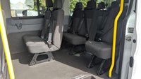 USED 2015 FORD TRANSIT Minibus Tdci 460 TDCI 125 PS XLWB High Roof With (Rear Row Seats removed to make Rear Load Area) , Air Conditioning, Electric Windows, Tachpgraph, Remote Locking,  Alarm, Emergency Brake assist, ABS, Power Steering, Mud Flaps Front, Tow Bar in great condition . 1 Owner from New - Been used by the MOD . 2 Keys - 5 Main Dealer Service Stamps on the book (Last Serviced 23,586 Miles) . This is excellent value . Discover the perfect solution for group travel with this exceptional Ford Transit Minibus. This 17-seat model, a TDCI 460 with the potent 125 PS engine, offers the spaciousness of an extra-long wheelbase and the practicality of a high roof, making it ideal for airport transfers, hotel shuttles, or community transport.  Your passengers will travel in comfort, kept cool by both front and dedicated rear air conditioning. The driving experience is equally refined, featuring conveniences such as electric windows and remote central locking for easy access. Your safety and security are paramount, with the minibus equipped with ESP, Emergency Brake Assist, ABS, and an anti-theft alarm for complete peace of mind.  Practicality is at the forefront. A tachograph is fitted, and two 12V accessory power points ensure devices stay charged on the go. It also includes front mud flaps, a temporary spare wheel, and the added utility of a tow bar, ready for your next requirement.  This vehicle presents a rare and highly appealing history. It has been with just one owner from new, having previously served with the Ministry of Defence, and it comes with two sets of keys. Its meticulous maintenance is documented with 5 service stamps in the book. Combining its low mileage, exceptional provenance, and comprehensive feature set, this Ford Transit minibus is excellent value and ready for a new chapter. 