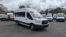 USED 2015 FORD TRANSIT Minibus Tdci 460 TDCI 125 PS XLWB High Roof With (Rear Row Seats removed to make Rear Load Area) , Air Conditioning, Electric Windows, Tachpgraph, Remote Locking,  Alarm, Emergency Brake assist, ABS, Power Steering, Mud Flaps Front, Tow Bar in great condition . 1 Owner from New - Been used by the MOD . 2 Keys - 5 Main Dealer Service Stamps on the book (Last Serviced 23,586 Miles) . This is excellent value . Discover the perfect solution for group travel with this exceptional Ford Transit Minibus. This 17-seat model, a TDCI 460 with the potent 125 PS engine, offers the spaciousness of an extra-long wheelbase and the practicality of a high roof, making it ideal for airport transfers, hotel shuttles, or community transport.  Your passengers will travel in comfort, kept cool by both front and dedicated rear air conditioning. The driving experience is equally refined, featuring conveniences such as electric windows and remote central locking for easy access. Your safety and security are paramount, with the minibus equipped with ESP, Emergency Brake Assist, ABS, and an anti-theft alarm for complete peace of mind.  Practicality is at the forefront. A tachograph is fitted, and two 12V accessory power points ensure devices stay charged on the go. It also includes front mud flaps, a temporary spare wheel, and the added utility of a tow bar, ready for your next requirement.  This vehicle presents a rare and highly appealing history. It has been with just one owner from new, having previously served with the Ministry of Defence, and it comes with two sets of keys. Its meticulous maintenance is documented with 5 service stamps in the book. Combining its low mileage, exceptional provenance, and comprehensive feature set, this Ford Transit minibus is excellent value and ready for a new chapter. 