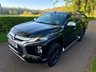 USED 2021 21 MITSUBISHI L200 2.2 DI-D DC Barbarian X Pickup Double Cab 4dr Diesel Auto 4WD Euro 6 (s/s) (150 ps) + SERVICE HISTORY + 18" ALLOY WHEELS + AUTOMATIC GEARBOX + DAYTIME RUNNING LIGHTS + TOW BAR + SATELLITE NAVIGATION + 1/2 LEATHER SEATS + HEATED FRONT SEATS + HEATED STEERING WHEEL + AUTO HEADLIGHTS + FRONT AND REAR PARKING SENSORS + REAR CAMERA + DUAL CLIMATE CONTROL + CRUISE CONTROL + BLUETOOTH / TELEPHONE PREPARATION + RADIO / USB / DAB / MP3 PLAYER + MUCH MUCH MORE...