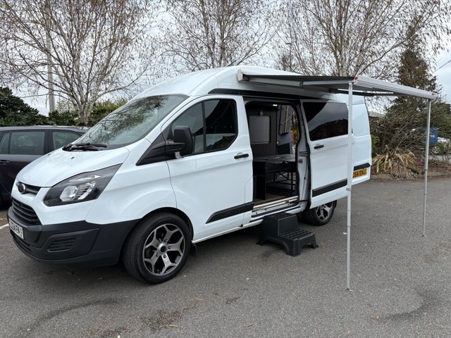 View our Ford Transit Custom High Top Camper Conversion 2.2 TDCi 290 Pan 5dr (186 g/km, 98 bhp)