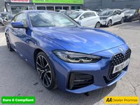 USED 2021 70 BMW 4 SERIES Blue 2.0 420d MHT M Sport coupe, 53,300 miles, ULEZ compliant, Automatic, Leather, 18in Alloys, A/C, Bluetooth, DAB, Sat Nav, Harman Kardon,  This 2021 BMW 4 Series 420d M Sport offers an exceptional blend of performance and advanced technology.  As a Euro 6 compliant model, it features a 2.0 litre diesel hybrid engine, providing efficient power.  The M Sport trim enhances its sporty appeal, complemented by the M Sport Pro Package and striking blue high gloss M Sport brakes.  Inside, you'll find the Premium Branded Sound System, including a Harman Kardon loudspeaker system, and the comprehensive Technology Plus Pack. This pack include