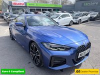 USED 2021 70 BMW 4 SERIES Blue 2.0 420d MHT M Sport coupe, 53,300 miles, ULEZ compliant, Automatic, Leather, 18in Alloys, A/C, Bluetooth, DAB, Sat Nav, Harman Kardon,  This 2021 BMW 4 Series 420d M Sport offers an exceptional blend of performance and advanced technology.  As a Euro 6 compliant model, it features a 2.0 litre diesel hybrid engine, providing efficient power.  The M Sport trim enhances its sporty appeal, complemented by the M Sport Pro Package and striking blue high gloss M Sport brakes.  Inside, you'll find the Premium Branded Sound System, including a Harman Kardon loudspeaker system, and the comprehensive Technology Plus Pack. This pack include