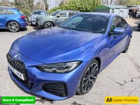 USED 2021 70 BMW 4 SERIES Blue 2.0 420d MHT M Sport coupe, 53,300 miles, ULEZ compliant, Automatic, Leather, 18in Alloys, A/C, Bluetooth, DAB, Sat Nav, Harman Kardon,  This 2021 BMW 4 Series 420d M Sport offers an exceptional blend of performance and advanced technology.  As a Euro 6 compliant model, it features a 2.0 litre diesel hybrid engine, providing efficient power.  The M Sport trim enhances its sporty appeal, complemented by the M Sport Pro Package and striking blue high gloss M Sport brakes.  Inside, you'll find the Premium Branded Sound System, including a Harman Kardon loudspeaker system, and the comprehensive Technology Plus Pack. This pack include
