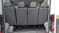 USED 2015 15 FORD TRANSIT BUS LWB Minibus 17 Seat Tdci 460 TDCI 125 PS XLWB High Roof With Air Conditioning, Electric Windows, Tachograph, Remote Locking,  Alarm, Emergency Brake assist, ABS, Power Steering, Mud Flaps Front, Tow Bar in great condition . 1 Owner from New - Been used by the MOD . 2 Keys - Service Stamp. This is excellent value . Discover the perfect solution for group travel with this exceptional Ford Transit Minibus. This 17-seat model, a TDCI 460 with the potent 125 PS engine, offers the spaciousness of an extra-long wheelbase and the practicality of a high roof, making it ideal for airport transfers, hotel shuttles, or community transport.  Your passengers will travel in comfort, kept cool by both front and dedicated rear air conditioning. The driving experience is equally refined, featuring conveniences such as electric windows and remote central locking for easy access. Your safety and security are paramount, with the minibus equipped with ESP, Emergency Brake Assist, ABS, and an anti-theft alarm for complete peace of mind.  Practicality is at the forefront. A tachograph is fitted, and two 12V accessory power points ensure devices stay charged on the go. It also includes front mud flaps, a temporary spare wheel, and the added utility of a tow bar, ready for your next requirement.  This vehicle presents a rare and highly appealing history. It has been with just one owner from new, having previously served with the Ministry of Defence, and it comes with two sets of keys. Its meticulous maintenance is documented with 5 service stamps in the book. Combining its low mileage, exceptional provenance, and comprehensive feature set, this Ford Transit minibus is excellent value and ready for a new chapter. 