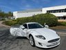 USED 2014 14 JAGUAR XK 5.0 V8 Signature Coupe 2dr Petrol Auto Euro 5 (385 ps)-Unrepeatable Example, Having Only Covered 11000 Miles From New.Supplied New By Stratstone Jaguar, Swansea-Finished In Polaris White With Heated Ebony Leather Upholstery-Very Special Car Indeed. 