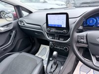 USED 2022 22 FORD FIESTA Red 1.0T EcoBoost MHEV Titanium Vignale hatchback, 16,250 miles, ULEZ compliant, Auto, Sat Nav, B&O audio, Panorama roof, Camera, 17in alloys, A/C. This 2022 Ford Fiesta Titanium Vignale boasts an exceptionally low mileage of just 16,250 miles, a testament to its careful single owner. This Euro 6 compliant 1.0L Petrol Hybrid is presented with a full dealership service history, most recently serviced on 28 February 2025 at 11,975 miles. A 12 month MOT will be provided on purchase, and the vehicle comes with a 3 month warranty for your peace of mind.  Experience the refined features of this Fiesta, including an opening panorama roof that floo