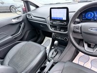 USED 2022 22 FORD FIESTA Red 1.0T EcoBoost MHEV Titanium Vignale hatchback, 16,250 miles, ULEZ compliant, Auto, Sat Nav, B&O audio, Panorama roof, Camera, 17in alloys, A/C. This 2022 Ford Fiesta Titanium Vignale boasts an exceptionally low mileage of just 16,250 miles, a testament to its careful single owner. This Euro 6 compliant 1.0L Petrol Hybrid is presented with a full dealership service history, most recently serviced on 28 February 2025 at 11,975 miles. A 12 month MOT will be provided on purchase, and the vehicle comes with a 3 month warranty for your peace of mind.  Experience the refined features of this Fiesta, including an opening panorama roof that floo