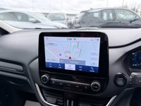 USED 2022 22 FORD FIESTA Red 1.0T EcoBoost MHEV Titanium Vignale hatchback, 16,250 miles, ULEZ compliant, Auto, Sat Nav, B&O audio, Panorama roof, Camera, 17in alloys, A/C. This 2022 Ford Fiesta Titanium Vignale boasts an exceptionally low mileage of just 16,250 miles, a testament to its careful single owner. This Euro 6 compliant 1.0L Petrol Hybrid is presented with a full dealership service history, most recently serviced on 28 February 2025 at 11,975 miles. A 12 month MOT will be provided on purchase, and the vehicle comes with a 3 month warranty for your peace of mind.  Experience the refined features of this Fiesta, including an opening panorama roof that floo