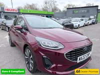 USED 2022 22 FORD FIESTA Red 1.0T EcoBoost MHEV Titanium Vignale hatchback, 16,250 miles, ULEZ compliant, Auto, Sat Nav, B&O audio, Panorama roof, Camera, 17in alloys, A/C. This 2022 Ford Fiesta Titanium Vignale boasts an exceptionally low mileage of just 16,250 miles, a testament to its careful single owner. This Euro 6 compliant 1.0L Petrol Hybrid is presented with a full dealership service history, most recently serviced on 28 February 2025 at 11,975 miles. A 12 month MOT will be provided on purchase, and the vehicle comes with a 3 month warranty for your peace of mind.  Experience the refined features of this Fiesta, including an opening panorama roof that floo