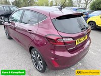 USED 2022 22 FORD FIESTA Red 1.0T EcoBoost MHEV Titanium Vignale hatchback, 16,250 miles, ULEZ compliant, Auto, Sat Nav, B&O audio, Panorama roof, Camera, 17in alloys, A/C. This 2022 Ford Fiesta Titanium Vignale boasts an exceptionally low mileage of just 16,250 miles, a testament to its careful single owner. This Euro 6 compliant 1.0L Petrol Hybrid is presented with a full dealership service history, most recently serviced on 28 February 2025 at 11,975 miles. A 12 month MOT will be provided on purchase, and the vehicle comes with a 3 month warranty for your peace of mind.  Experience the refined features of this Fiesta, including an opening panorama roof that floo
