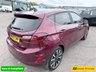 USED 2022 22 FORD FIESTA Red 1.0T EcoBoost MHEV Titanium Vignale hatchback, 16,250 miles, ULEZ compliant, Auto, Sat Nav, B&O audio, Panorama roof, Camera, 17in alloys, A/C. This 2022 Ford Fiesta Titanium Vignale boasts an exceptionally low mileage of just 16,250 miles, a testament to its careful single owner. This Euro 6 compliant 1.0L Petrol Hybrid is presented with a full dealership service history, most recently serviced on 28 February 2025 at 11,975 miles. A 12 month MOT will be provided on purchase, and the vehicle comes with a 3 month warranty for your peace of mind.  Experience the refined features of this Fiesta, including an opening panorama roof that floo
