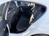 USED 2018 67 BMW 1 SERIES White 1.5 116d M Sport Shadow Edition, 40,000 miles, ULEZ compliant, 6-speed manual, 18in alloys, Sat Nav, A/C, Cruise, DAB, HK audio, rear sensors. This 2018 BMW 1 Series 116d M Sport Shadow Edition boasts exceptionally low mileage for its age, having covered just 40,000 miles, and has been cared for by only two owners.  This Euro 6 compliant 1.5L diesel model comes with a 12 month MOT provided on purchase, ensuring peace of mind.  It features automatic single zone climate control, a rain sensor that activates headlights automatically, and rear parking distance control for added convenience.  Enjoy seamless connectivity with Bluetooth hands