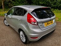 USED 2014 64 FORD FIESTA 1.0T EcoBoost Titanium Hatchback 5dr Petrol Manual Euro 5 (s/s) (100 ps) 1 FAMILY OWNED WITH ONLY 54,600 MILES//20 POUND ROAD TAX A YEAR//GREAT SERVICE HISTORY -FULL WET BELT REPLACEMENT-UPPER AND LOWER+ WATER PUMP JUST RENEWED BY US//BLUETOOTH//DAB,,ELECTRIC FOLDING MIRRORS//ALLOYS//AIRCON//REAR PARKING SENSORS//FULL SIZE SPARE WHEEL//FRONT FOG LIGHTS//GREAT SERVICE HISTORY X9 SERVICE STAMPS AND FULLY DOCUMENTED WITH INVOICES///NEW MOT JUST CARRIED OUT (100 ps) 1 FAMILY OWNED WITH ONLY 54,600 MILES//20 POUND ROAD TAX A YEAR//GREAT SERVICE HISTORY -FULL WET BELT REPLACEMENT-UPPER AND LOWER+ WATER PUMP JUST RENEWED BY US//BLUETOOTH//DAB,,ELECTRIC FOLDING MIRRORS//ALLOYS//AIRCON//REAR PARKING SENSORS//FULL SIZE SPARE WHEEL//FRONT FOG LIGHTS//GREAT SERVICE HISTORY X9 SERVICE STAMPS AND FULLY DOCUMENTED WITH INVOICES/////KEYLESS ENTRY AND STARTING