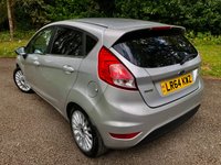 USED 2014 64 FORD FIESTA 1.0T EcoBoost Titanium Hatchback 5dr Petrol Manual Euro 5 (s/s) (100 ps) 1 FAMILY OWNED WITH ONLY 54,600 MILES//20 POUND ROAD TAX A YEAR//GREAT SERVICE HISTORY -FULL WET BELT REPLACEMENT-UPPER AND LOWER+ WATER PUMP JUST RENEWED BY US//BLUETOOTH//DAB,,ELECTRIC FOLDING MIRRORS//ALLOYS//AIRCON//REAR PARKING SENSORS//FULL SIZE SPARE WHEEL//FRONT FOG LIGHTS//GREAT SERVICE HISTORY X9 SERVICE STAMPS AND FULLY DOCUMENTED WITH INVOICES///NEW MOT JUST CARRIED OUT (100 ps) 1 FAMILY OWNED WITH ONLY 54,600 MILES//20 POUND ROAD TAX A YEAR//GREAT SERVICE HISTORY -FULL WET BELT REPLACEMENT-UPPER AND LOWER+ WATER PUMP JUST RENEWED BY US//BLUETOOTH//DAB,,ELECTRIC FOLDING MIRRORS//ALLOYS//AIRCON//REAR PARKING SENSORS//FULL SIZE SPARE WHEEL//FRONT FOG LIGHTS//GREAT SERVICE HISTORY X9 SERVICE STAMPS AND FULLY DOCUMENTED WITH INVOICES/////KEYLESS ENTRY AND STARTING