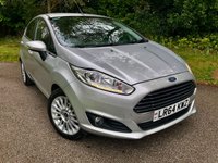 USED 2014 64 FORD FIESTA 1.0T EcoBoost Titanium Hatchback 5dr Petrol Manual Euro 5 (s/s) (100 ps) 1 FAMILY OWNED WITH ONLY 54,600 MILES//20 POUND ROAD TAX A YEAR//GREAT SERVICE HISTORY -FULL WET BELT REPLACEMENT-UPPER AND LOWER+ WATER PUMP JUST RENEWED BY US//BLUETOOTH//DAB,,ELECTRIC FOLDING MIRRORS//ALLOYS//AIRCON//REAR PARKING SENSORS//FULL SIZE SPARE WHEEL//FRONT FOG LIGHTS//GREAT SERVICE HISTORY X9 SERVICE STAMPS AND FULLY DOCUMENTED WITH INVOICES///NEW MOT JUST CARRIED OUT (100 ps) 1 FAMILY OWNED WITH ONLY 54,600 MILES//20 POUND ROAD TAX A YEAR//GREAT SERVICE HISTORY -FULL WET BELT REPLACEMENT-UPPER AND LOWER+ WATER PUMP JUST RENEWED BY US//BLUETOOTH//DAB,,ELECTRIC FOLDING MIRRORS//ALLOYS//AIRCON//REAR PARKING SENSORS//FULL SIZE SPARE WHEEL//FRONT FOG LIGHTS//GREAT SERVICE HISTORY X9 SERVICE STAMPS AND FULLY DOCUMENTED WITH INVOICES/////KEYLESS ENTRY AND STARTING