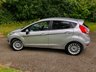 USED 2014 64 FORD FIESTA 1.0T EcoBoost Titanium Hatchback 5dr Petrol Manual Euro 5 (s/s) (100 ps) 1 FAMILY OWNED WITH ONLY 54,600 MILES//20 POUND ROAD TAX A YEAR//GREAT SERVICE HISTORY -FULL WET BELT REPLACEMENT-UPPER AND LOWER+ WATER PUMP JUST RENEWED BY US//BLUETOOTH//DAB,,ELECTRIC FOLDING MIRRORS//ALLOYS//AIRCON//REAR PARKING SENSORS//FULL SIZE SPARE WHEEL//FRONT FOG LIGHTS//GREAT SERVICE HISTORY X9 SERVICE STAMPS AND FULLY DOCUMENTED WITH INVOICES///NEW MOT JUST CARRIED OUT (100 ps) 1 FAMILY OWNED WITH ONLY 54,600 MILES//20 POUND ROAD TAX A YEAR//GREAT SERVICE HISTORY -FULL WET BELT REPLACEMENT-UPPER AND LOWER+ WATER PUMP JUST RENEWED BY US//BLUETOOTH//DAB,,ELECTRIC FOLDING MIRRORS//ALLOYS//AIRCON//REAR PARKING SENSORS//FULL SIZE SPARE WHEEL//FRONT FOG LIGHTS//GREAT SERVICE HISTORY X9 SERVICE STAMPS AND FULLY DOCUMENTED WITH INVOICES/////KEYLESS ENTRY AND STARTING