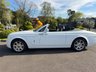 USED 2014 14 ROLLS-ROYCE PHANTOM 6.7 V12 Drophead Coupe 2dr Petrol Auto Euro 5 (453 bhp) ROLLS-ROYCE PHANTOM 6.7 V12 DROPHEAD COUPE SERIES II + SUPER LOW MILEAGE ONLY 3000 MILES FROM NEW + RARE SPECIFICATION + IMMACULATE CONDITION IN & OUT + VEHICLE SPEED PROPORTIONAL POWER STEERING + 21" ALLOYS + CRUISE CONTROL + LEXICON SOUND SYSTEM + Bi-XENON HEADLIGHTS WITH PROJECTOR BEAM LENSES + ELECTRONIC SOFT CONVERTIBLE ROOF WITH GLASS WINDOW + DOUBLE GLAZED WINDOWS + EBC + SELF LEVELLING SUSPENSION + SOFT CLOSE DOORS + NAVIGATION WITH VOICE CONTROL + HEATED WINDSCREEN WASHERS + MANY