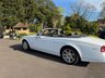 USED 2014 14 ROLLS-ROYCE PHANTOM 6.7 V12 Drophead Coupe 2dr Petrol Auto Euro 5 (453 bhp) ROLLS-ROYCE PHANTOM 6.7 V12 DROPHEAD COUPE SERIES II + SUPER LOW MILEAGE ONLY 3000 MILES FROM NEW + RARE SPECIFICATION + IMMACULATE CONDITION IN & OUT + VEHICLE SPEED PROPORTIONAL POWER STEERING + 21" ALLOYS + CRUISE CONTROL + LEXICON SOUND SYSTEM + Bi-XENON HEADLIGHTS WITH PROJECTOR BEAM LENSES + ELECTRONIC SOFT CONVERTIBLE ROOF WITH GLASS WINDOW + DOUBLE GLAZED WINDOWS + EBC + SELF LEVELLING SUSPENSION + SOFT CLOSE DOORS + NAVIGATION WITH VOICE CONTROL + HEATED WINDSCREEN WASHERS + MANY