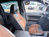 USED 2018 18 FORD RANGER Black 3.2 TDCi Wildtrak pickup, 98,000 miles, Automatic 4WD, 18in Alloys, Sat nav, Rear camera, Touchscreen, A/C. Plus VAT @ 20%! This 2018 Ford Ranger TDCi Wildtrak is ready for its next adventure, benefiting from a 12 month MOT provided on purchase and a 3 month warranty for your peace of mind. and a very goood service History @ 1K, 23K, 34K, 46K, 58K, 73K, and 95K  Under the bonnet, you'll find a robust 3.2L diesel engine paired with a capable four wheel drive system, making it well suited for a variety of tasks and terrains.  Inside, the Wildtrak trim offers comfort and convenience with Dual Zone Electronic Automatic T