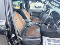 USED 2018 18 FORD RANGER Black 3.2 TDCi Wildtrak pickup, 98,000 miles, Automatic 4WD, 18in Alloys, Sat nav, Rear camera, Touchscreen, A/C. Plus VAT @ 20%! This 2018 Ford Ranger TDCi Wildtrak is ready for its next adventure, benefiting from a 12 month MOT provided on purchase and a 3 month warranty for your peace of mind. and a very goood service History @ 1K, 23K, 34K, 46K, 58K, 73K, and 95K  Under the bonnet, you'll find a robust 3.2L diesel engine paired with a capable four wheel drive system, making it well suited for a variety of tasks and terrains.  Inside, the Wildtrak trim offers comfort and convenience with Dual Zone Electronic Automatic T